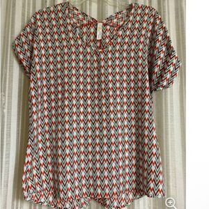 Ladies sz small blouse by tini lili Multiple color New without tags